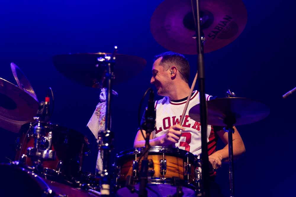 Peter playing drum set